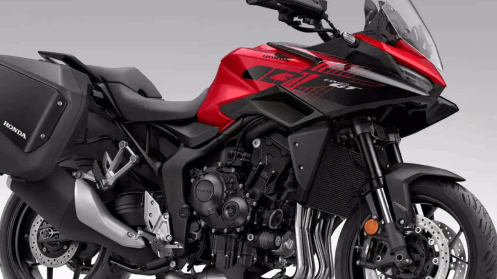 Honda CB1000GT 2026 combina motor 1000cc, suspensão eletrônica, tecnologia avançada e conforto para longas viagens em uma sport-tourer completa.