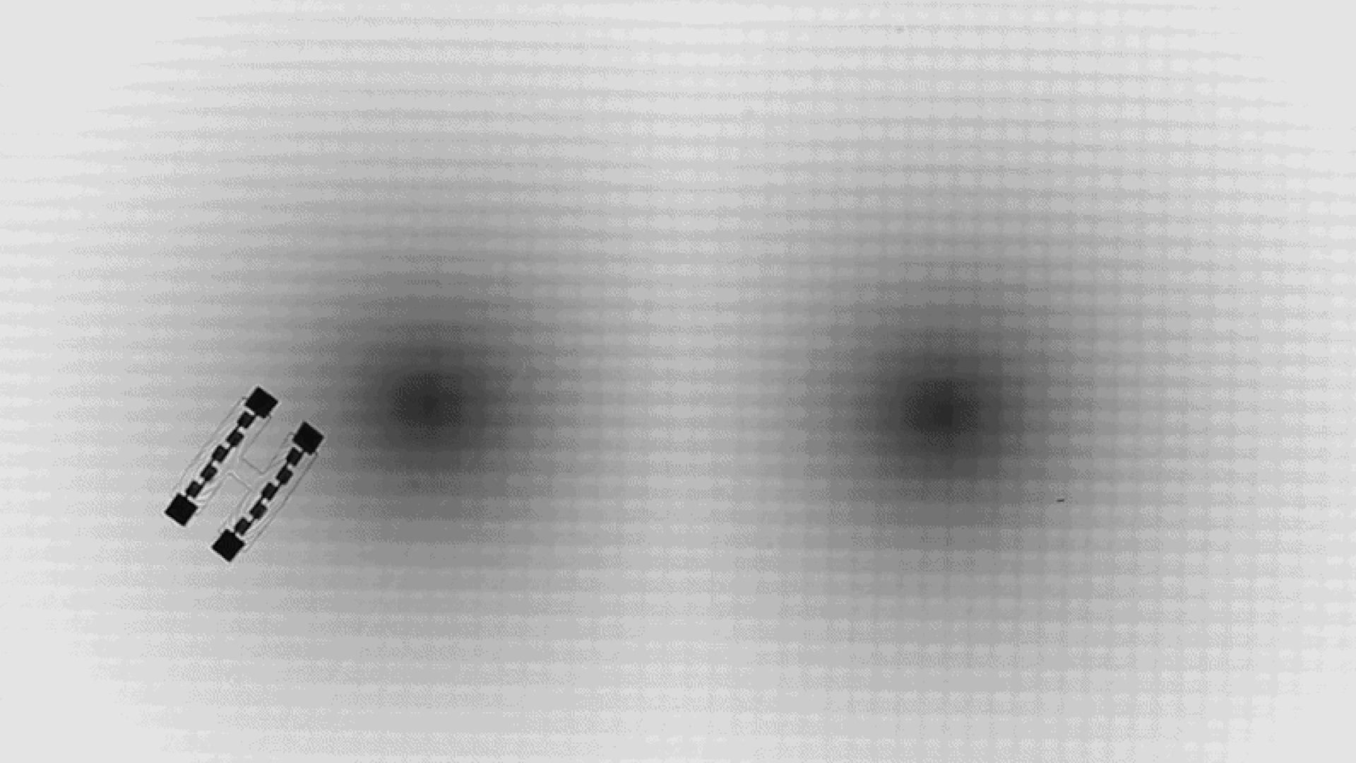 Utilizando as regras da relatividade geral, cientistas ensinaram robôs a navegar em "espaços-tempos artificiais", onde regiões mais escuras representavam áreas de gravidade intensa. (Crédito da imagem: Reinhardt et al. / CC-BY 4.0)